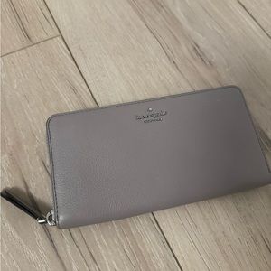 Kate spade large continental wallet in soft taupe. Brand new.